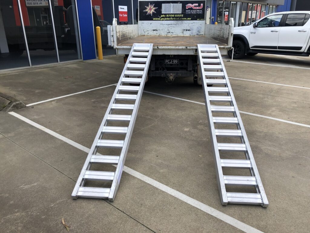 If your main bike transport vehicle is a trailer or an ute with a bed liner, then a pair of classic motorcycle bike ramps is what you need. But there’s much more to a good classic ramp than just making a way up or down: it’s about convenience. As a minimum, you want to take advantage of the superior qualities an aluminium motor bike ramp is going to offer, including: