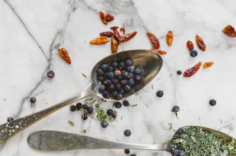 Ingridiants in spoon and on table