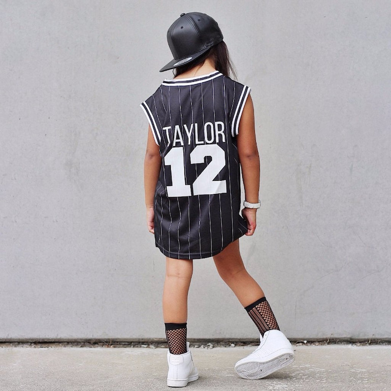 kid wearing basketball jersey