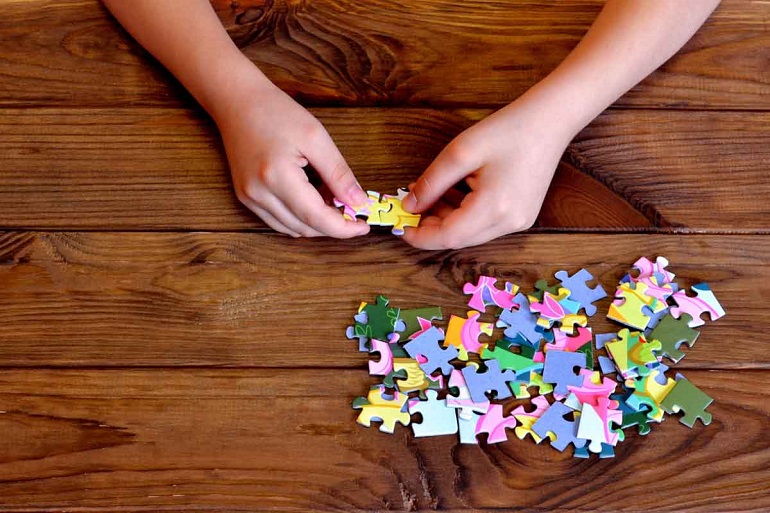 a man making a puzzle